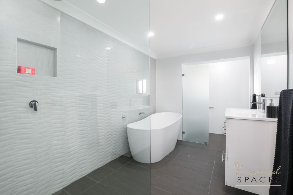 crisp white bathroom renovationFree standing bath tub