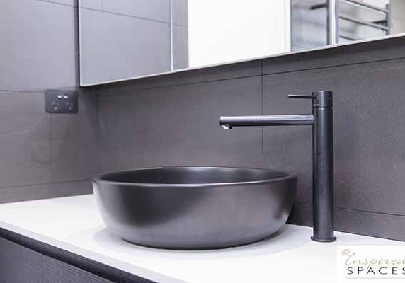 Black tapware and vanity basin
