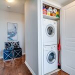 European laundry with stacked appliances